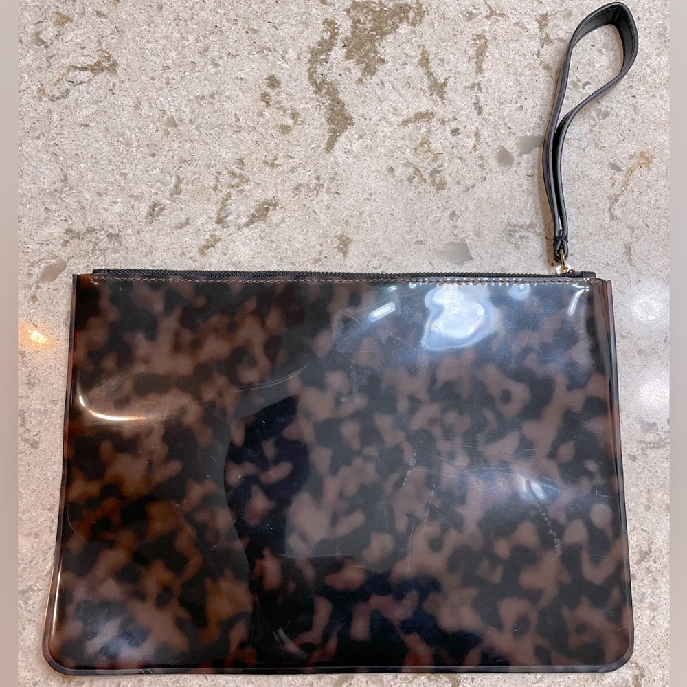 Sleek envelope clutch with wrist strap